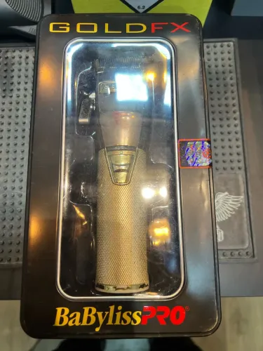Máquina de cortar cabelo - Babyliss Gold Fx 