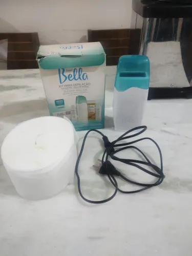 Aparelho aquecedor de cera(depilador)Bivolt funcionando perfeitamente usado apenas 2 vezes