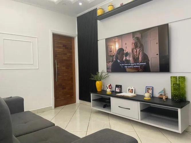 Casa com 2 dormitórios à venda, 142 m² por R$ 636.000,00 - Vila Guilhermina - Praia Grande