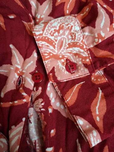 Blusa da Pernambucanas com botões na frente e amarração