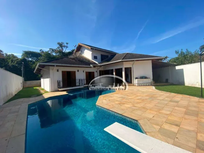 Casa com 4 dormitórios à venda, 547 m² por R$ 2.498.000,00 - Condomínio São Joaquim - Vinh