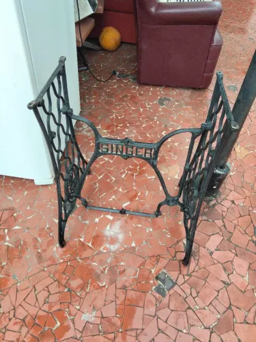 Pé de máquina Singer