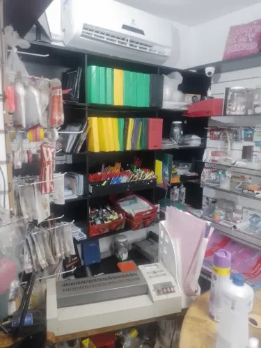 Repasse de loja comercial com vários objetos e maquinas novas 