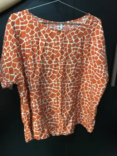 Blusa estampa de girafa