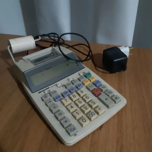 Troco por celular .. Calculadora com impressora