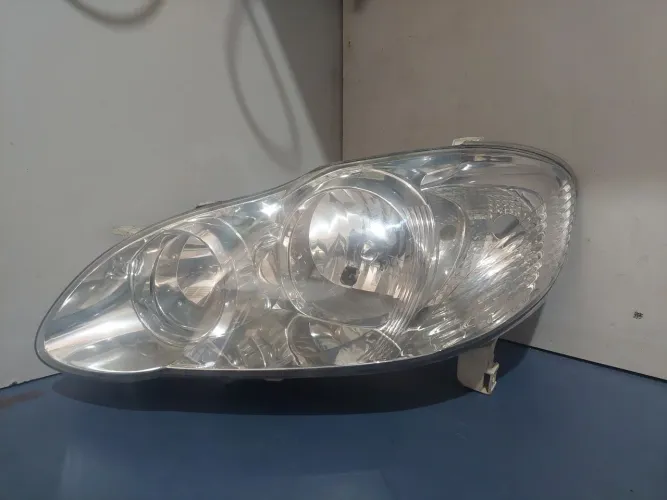 Farol Toyota Corolla 03/07 Original 