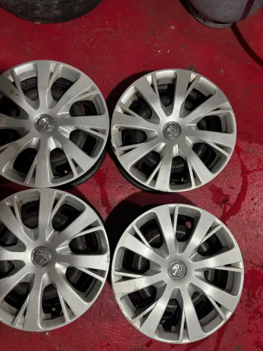 Jogo 04 rodas de ferro 4x108 Aro 15 Peugeot com calotas