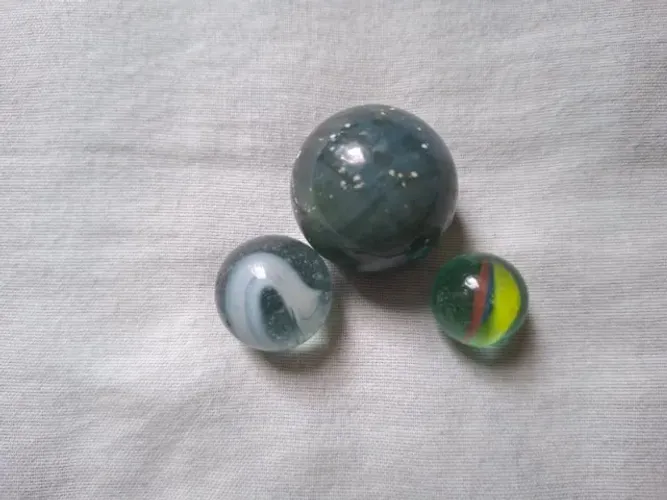 Bolinhas de gude (Peteca)