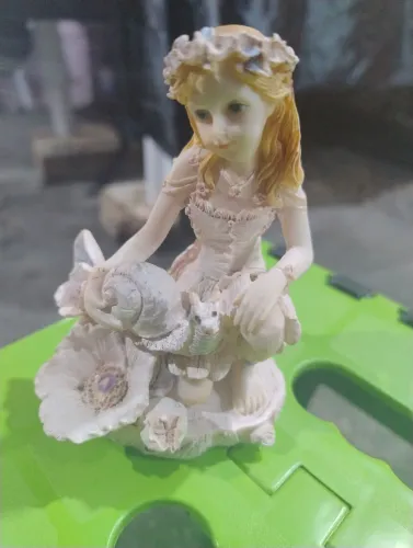 Estatueta em Resina