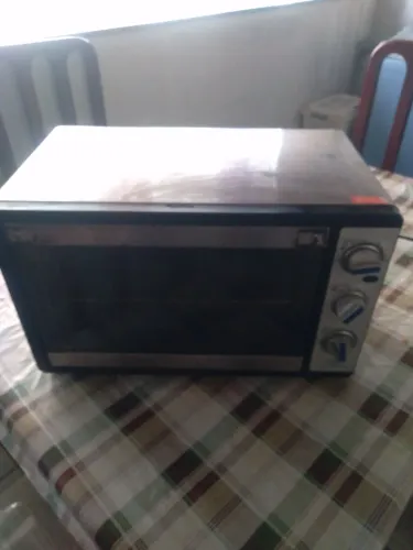 Vendo forninho funcionando bem falta só o puxador da porta
