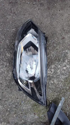 Farol Onix plus LT LTZ original GM Chevrolet lado esquerdo motorista com detalhe