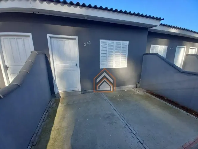 Casa com 2 dormitórios para alugar, 60 m² por R$ 1.210,00/mês - Piratini - Alvorada/RS