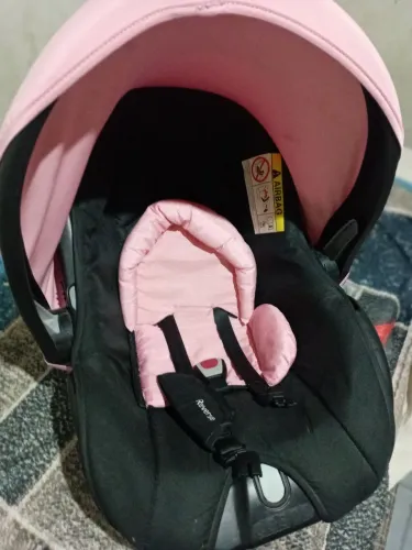 Bebê conforto rosa seminovo