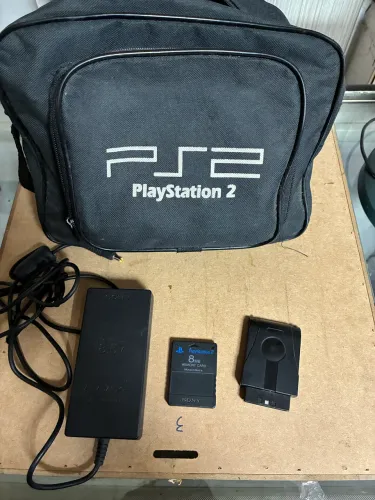 Jogos +bolsa+adaptador fonte + memória card