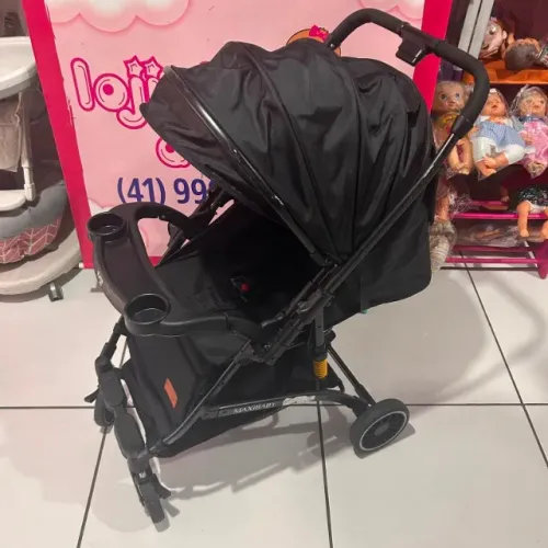 Carrinho passeio vira berço preto nivie maxi baby