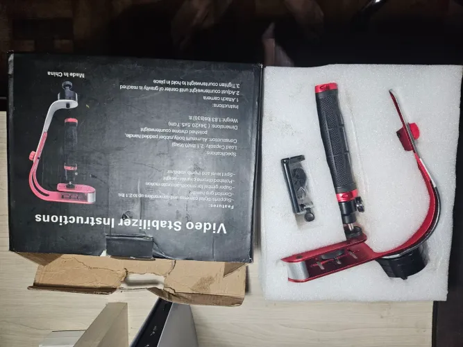 Estabilizador de Vídeo Steadycam Portátil para Câmera e Celular (Novo na Caixa)