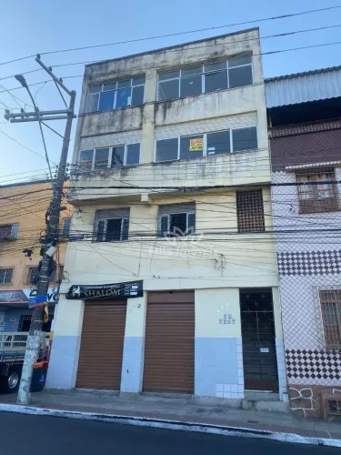 Prédio residencial com 3 apartamentos e 2 lojas à venda, 445 m² por R$ 650.000 - Vila Rubi