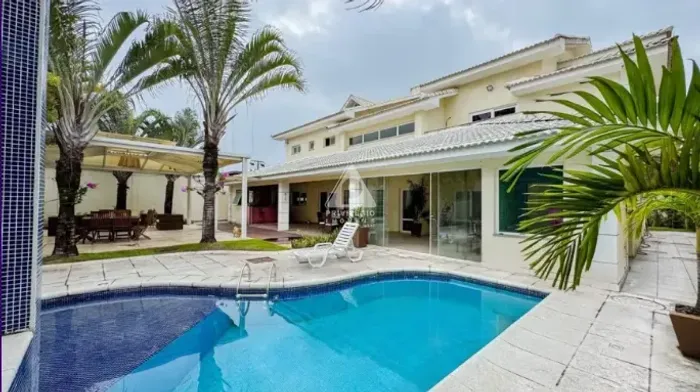 Casa de Luxo no Santa Mônica Jardins com 612m², 5 Suítes, Piscina e Área Gourmet Barra da