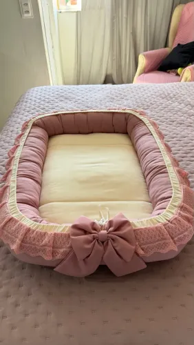Ninho redutor de berço menina