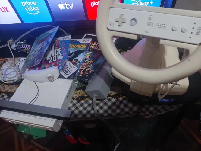 Nintendo wii desbloqueado com volante e 15 jogos na memória