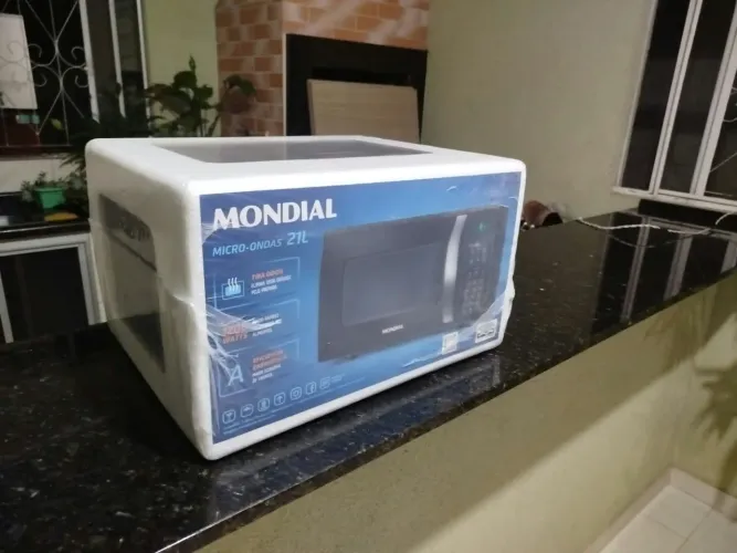 Microondas Mondial 21L 127v NOVO, NA EMBALAGEM, LACRADO, sem detalhes ou observações.