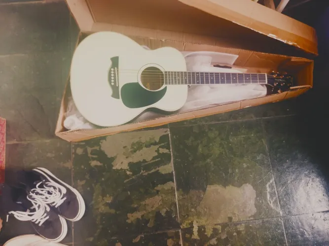 Violão baby Tagima porteno mini SG verde claro.