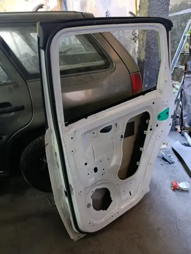 Porta spin lado direito trazaeira
