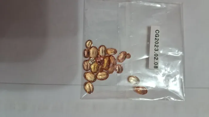 Lote com 21 Gemas preciosas topázio imperial 15,3m26 Ct, com certificado de gemologo 