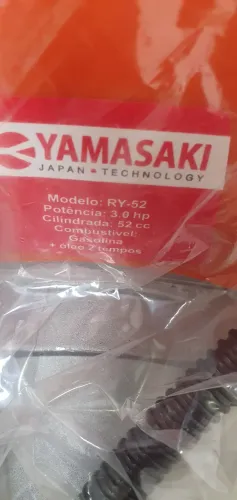 Vendo roçadeira top nunca usado.