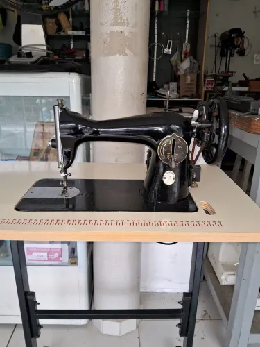 Vendo máquina de costura singer original
