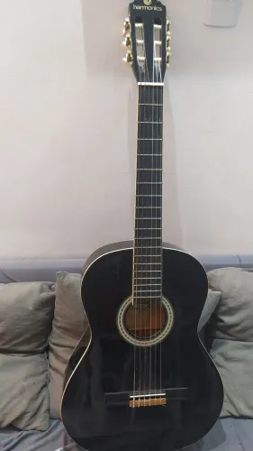 Vende se violão semi novo harmonics