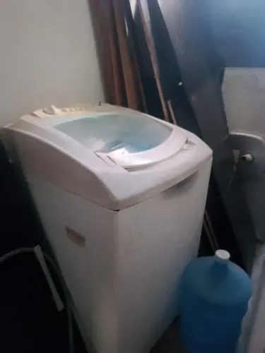 Máquina de lavar com defeito 