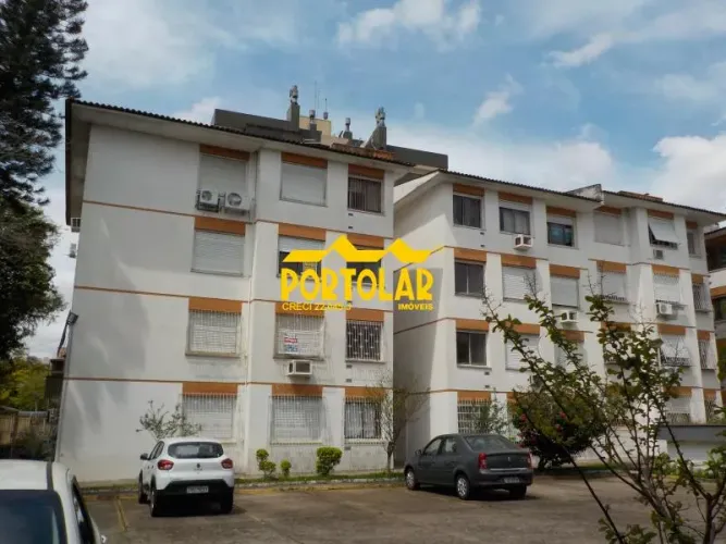 Ótimo apartamento, de fundos, com dois dormitórios, living amplo para dois ambientes, cozi