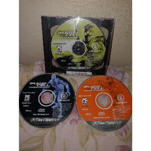 Tom Clancys Splinter Cell Pandoras Tomorrow 2004 jogo antigo PC CD