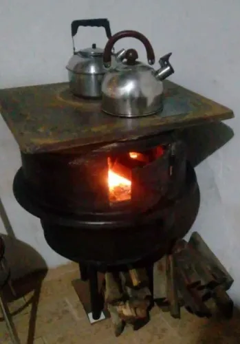 Fogão á lenha feito com aro de caminhão<br>