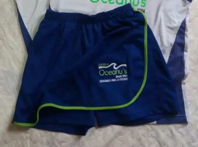 SHORT-SAIA COLÉGIO OCEANUS (SERRA/ES) TAM G (12 A 14 ANOS) SEMINOVO, EM PERFEITO ESTADO!