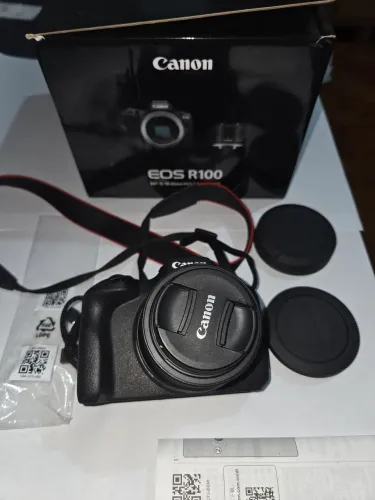 Canon r100 pouquissima usada com acessórios 