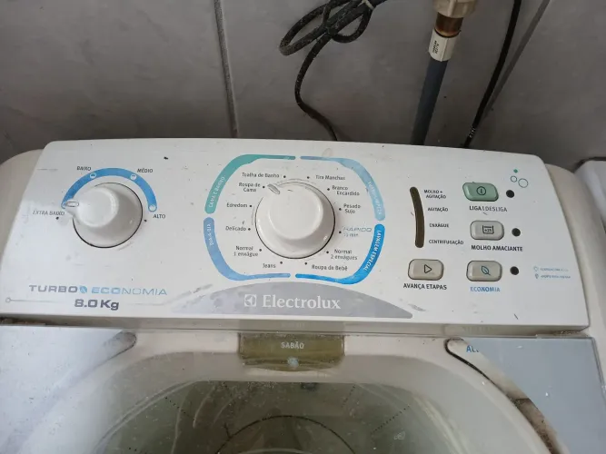 Máquina de lavar no estado