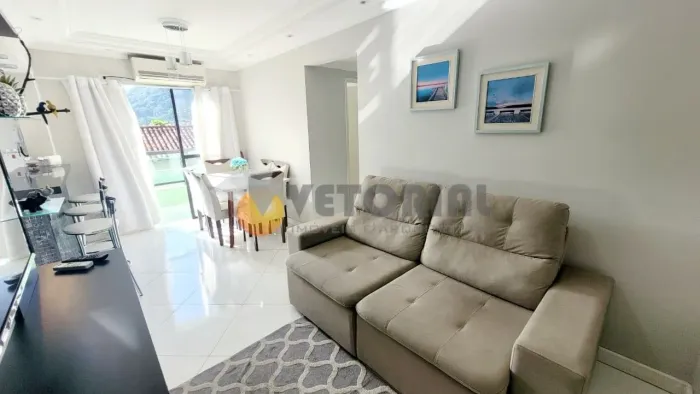 Apartamento com 2 dormitórios à venda, 58 m² por R$ 500.000,00 - Martim de Sá - Caraguatat