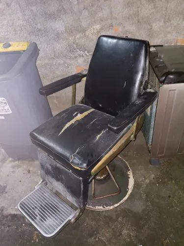 Cadeira antiga de barbearia 