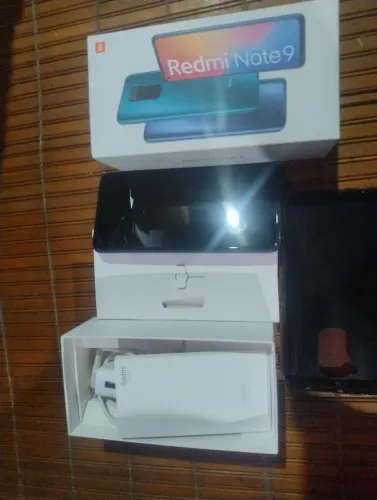 Vende se Redmi note 9 em perfeito estado  Caixa manual do aparelho carregador