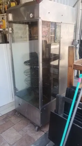Máquina de frango assado