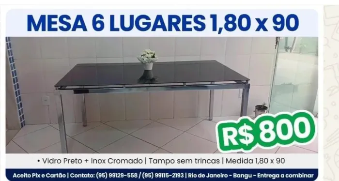 Mesa 6 lugares em aço inox e tampo de vidro.