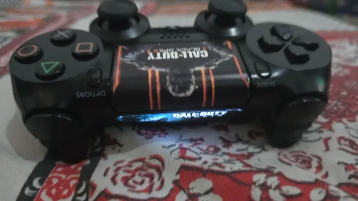 Controle de ps4 original funcionando perfeitamente 