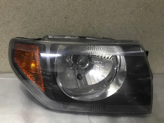 Farol Mitsubishi Pajero Tr4(máscara negra )