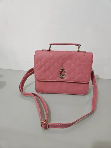 Bolsa feminina rosa com alça transversal