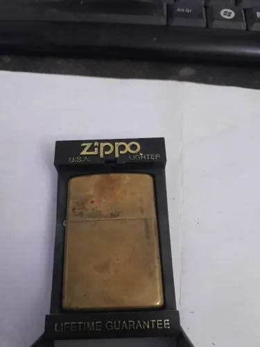 Isqueiro Zippo USMc, dourado, usado