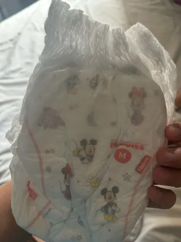 Fralda Huggies M e G 