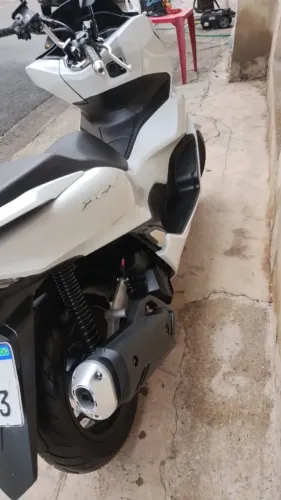 Moto quitada em meu nome. Com revisão em dia.