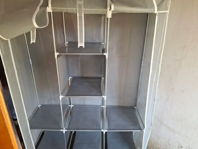 Vendo guarda roupa portátil 8 divisória novo